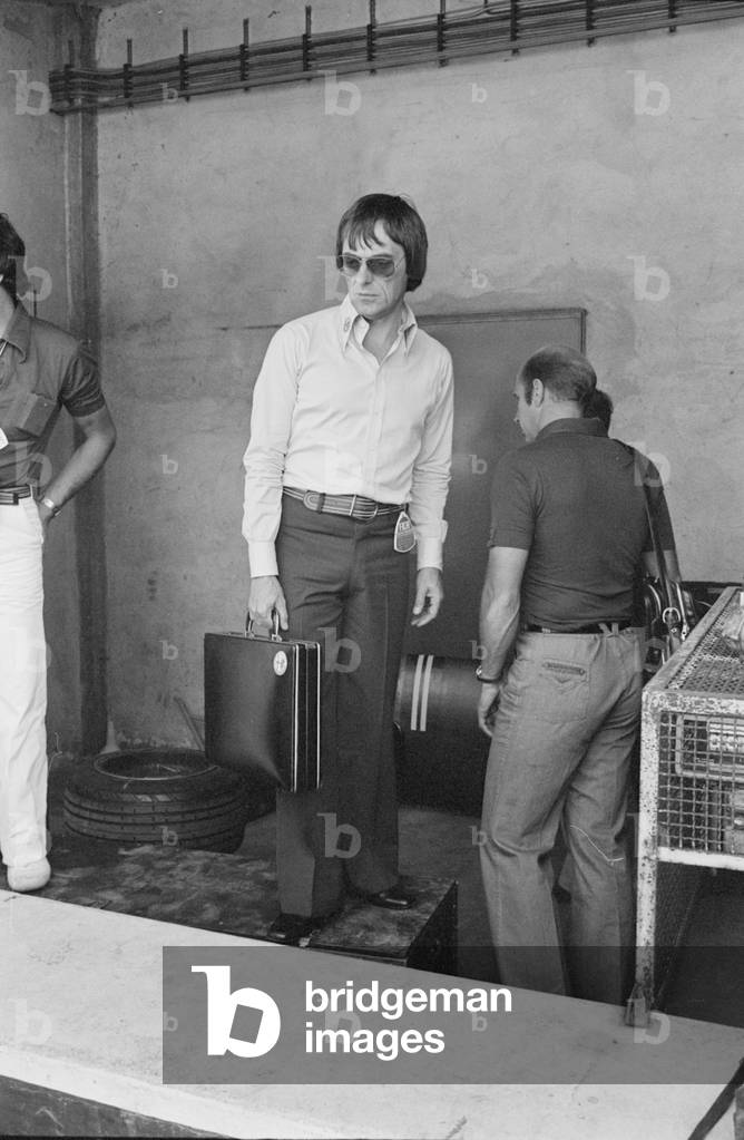 Bernie Ecclestone during the qualifying sessions of the Italian Gran Prix, Italy, 1977 (b/w photo)