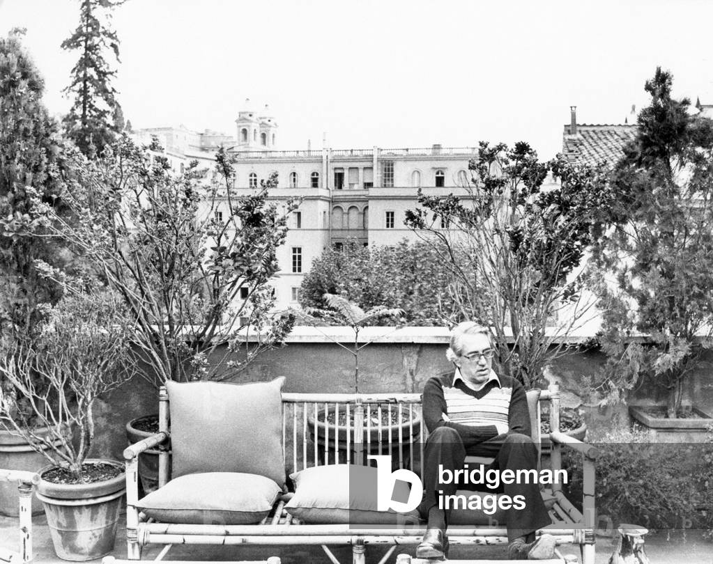 Giuseppe Patroni Griffi on a terrace, 1970 (b/w photo)