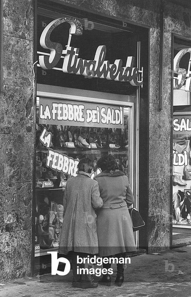 Clothing shop displaying goods on sale, Milan, 1979 (photo)