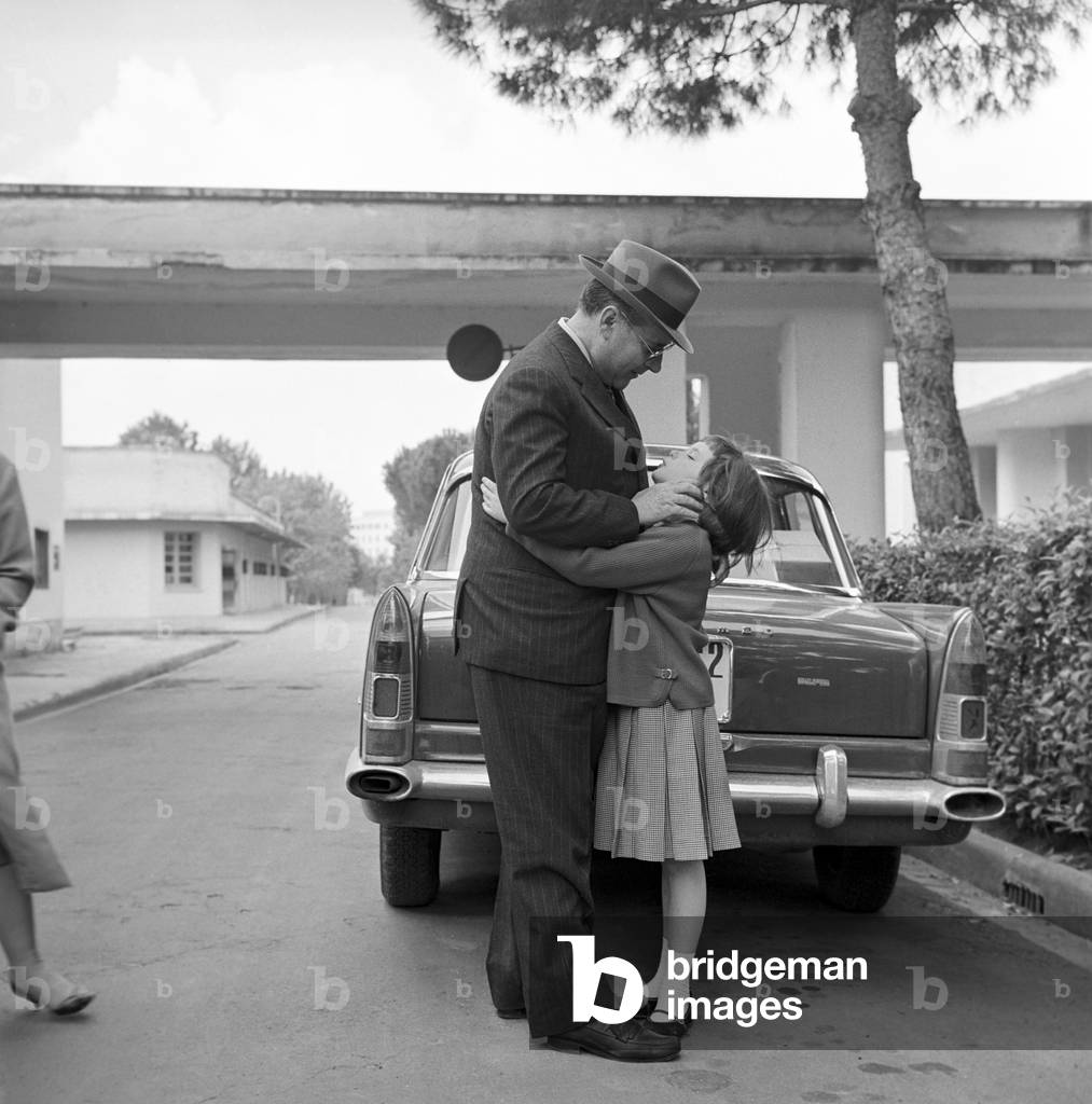 Roberto Rossellini with his family, Italy, 1960 (b/w photo)