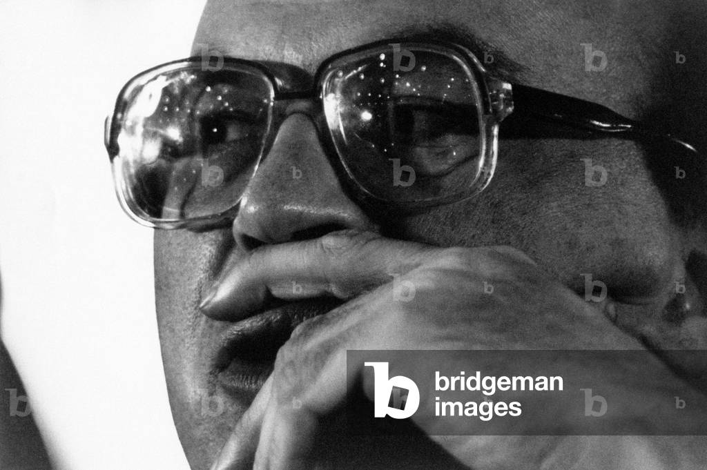 Portrait of Bettino Craxi with his hand on his lips