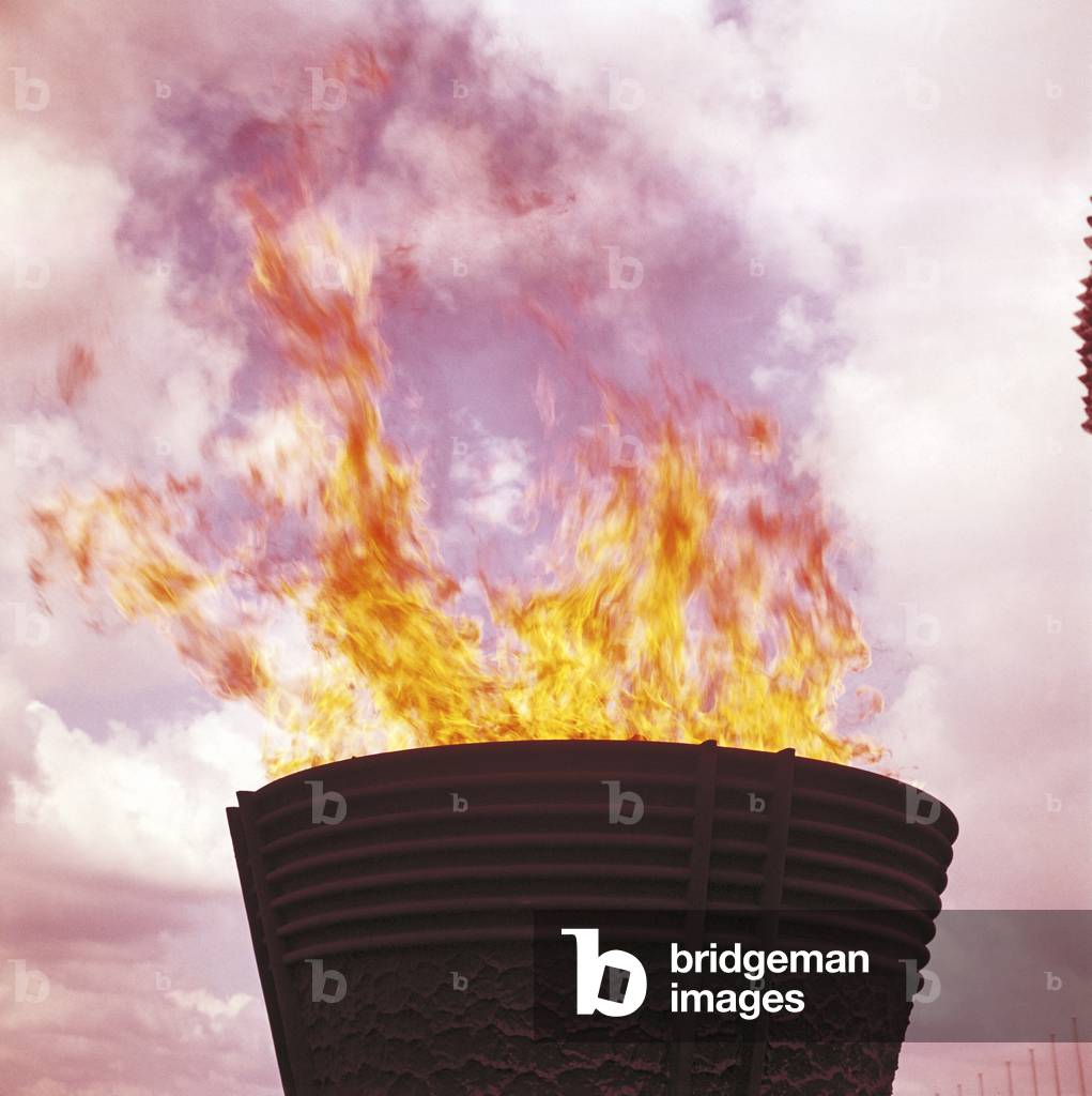 The fire is lit in the big Olympic cauldron of Tokyo Olympics