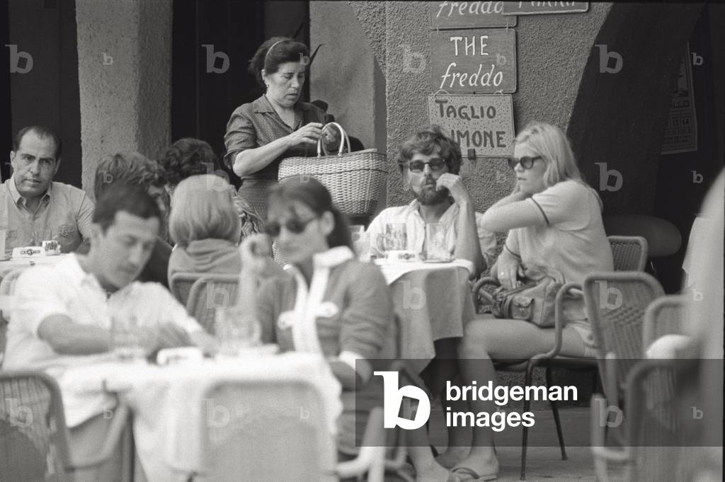 Tourists sitting at the bar