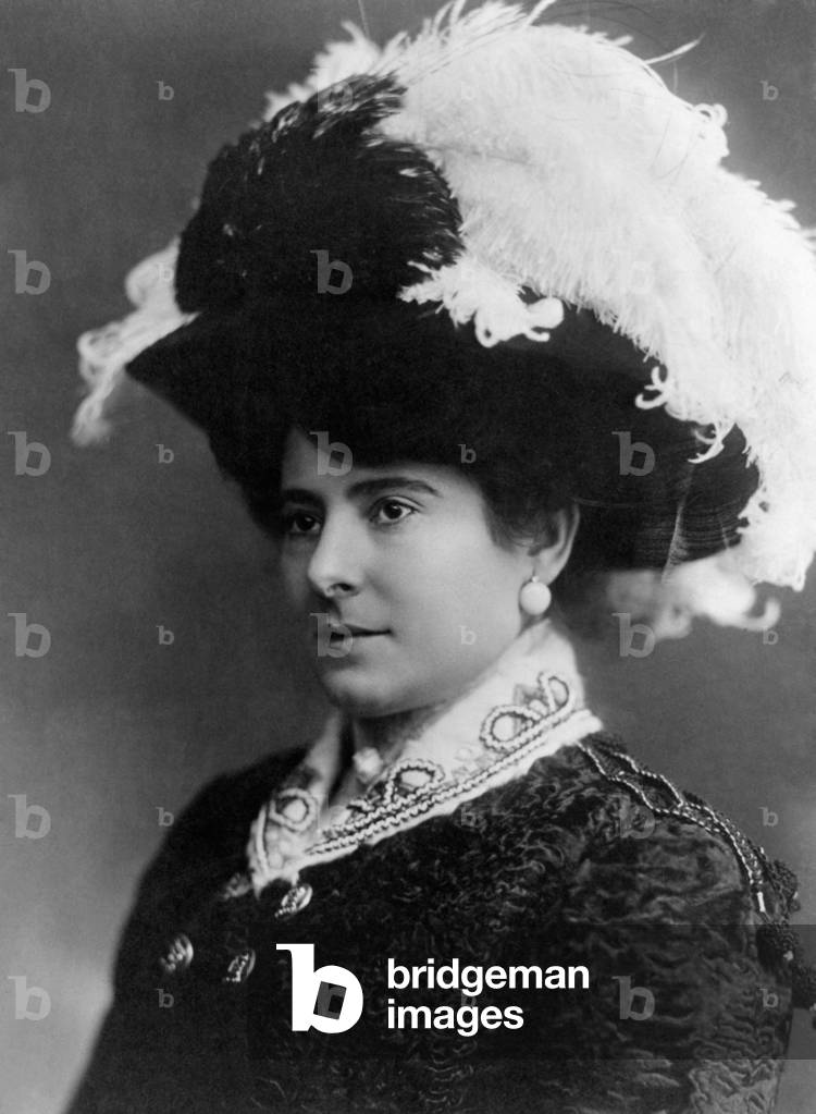Helena Rubinstein wearing a large hat with feathers, Australia