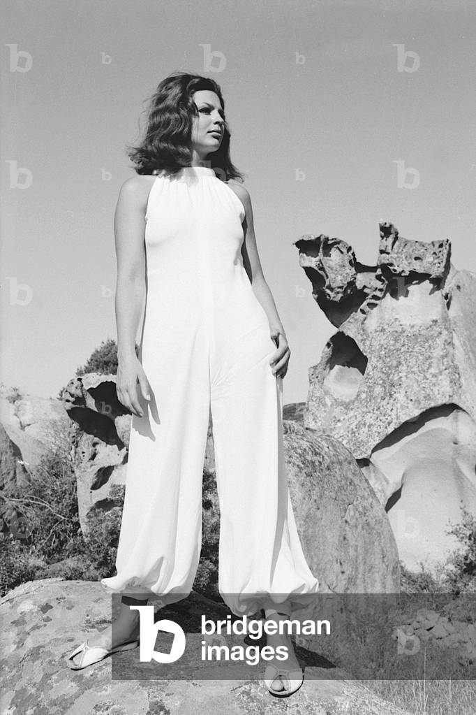 Ira von Fuerstenberg on a cliff in Porto Rotondo, Italy, 1967 (b/w photo)