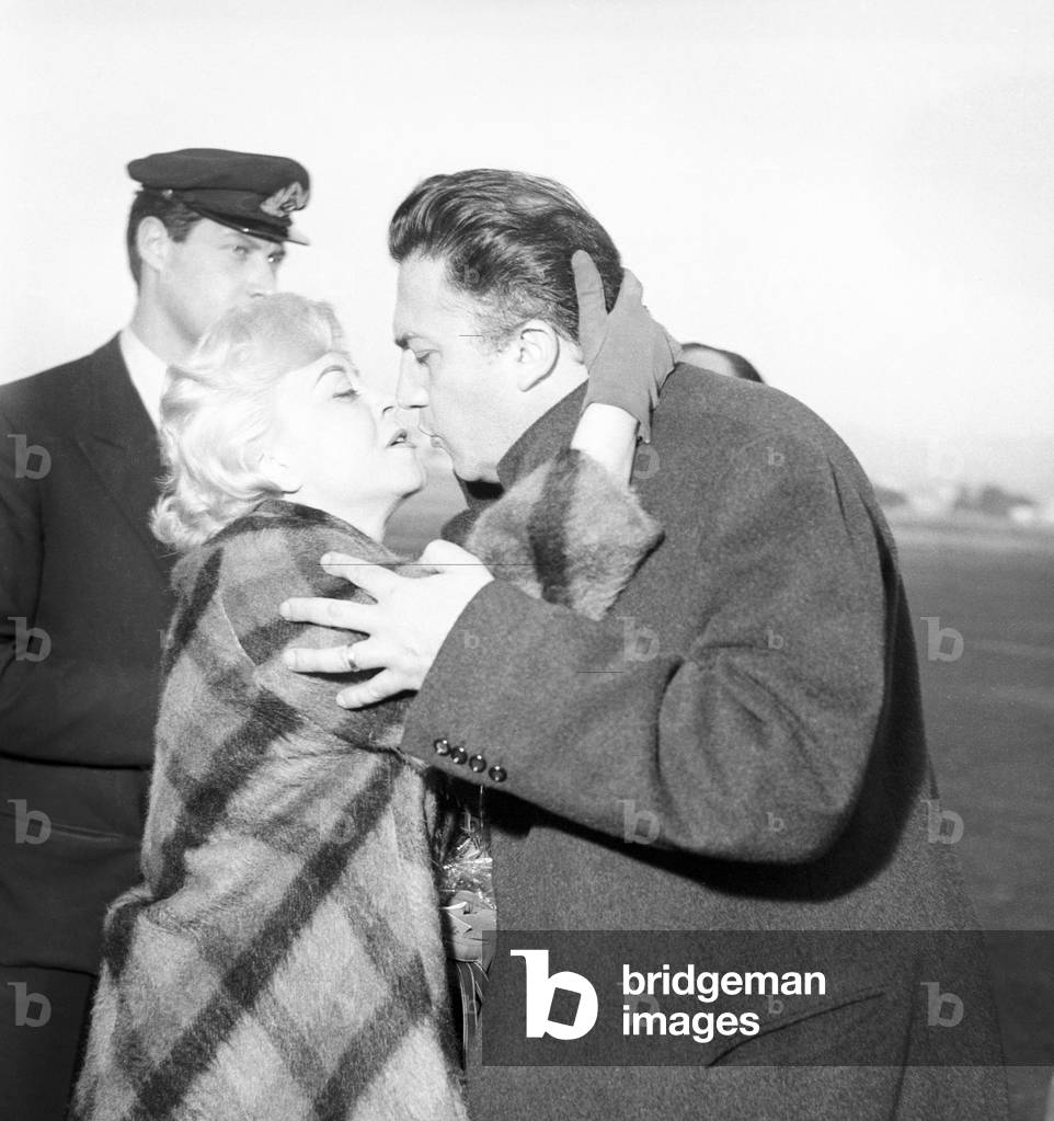 Giulietta Masina kissing Federico Fellini, Italy, 1959 (b/w photo)