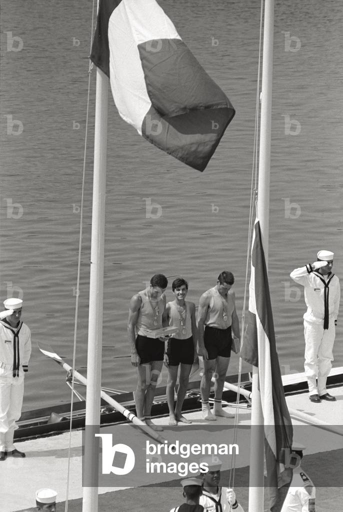 The Italian coxed pairs team is awarded with the gold medal