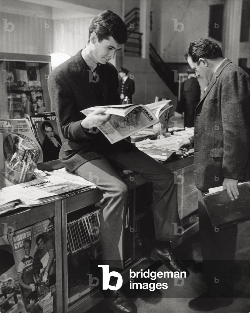 Anthony Perkins reading (b/w photo)