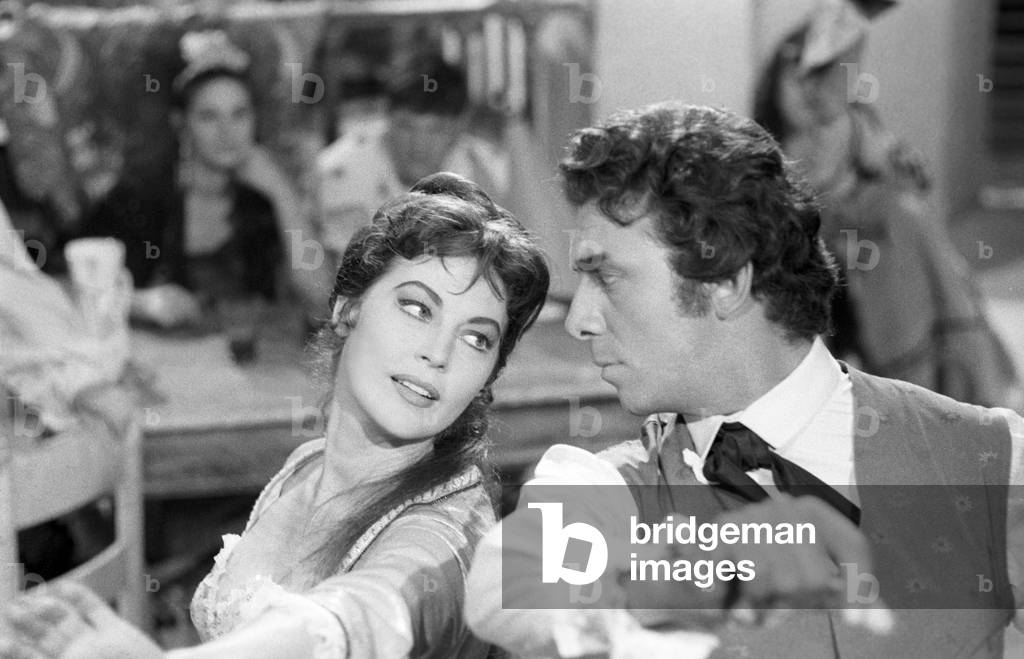 American actors Ava Gardner and Anthony Franciosa in a scene from the film 'The Naked Maja', Italy, 1958 (b/w photo)