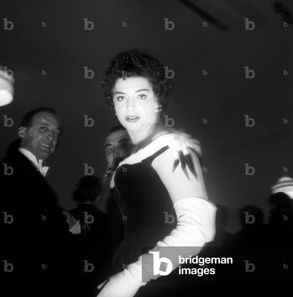 Katyna Ranieri wearing an evening dress and long gloves