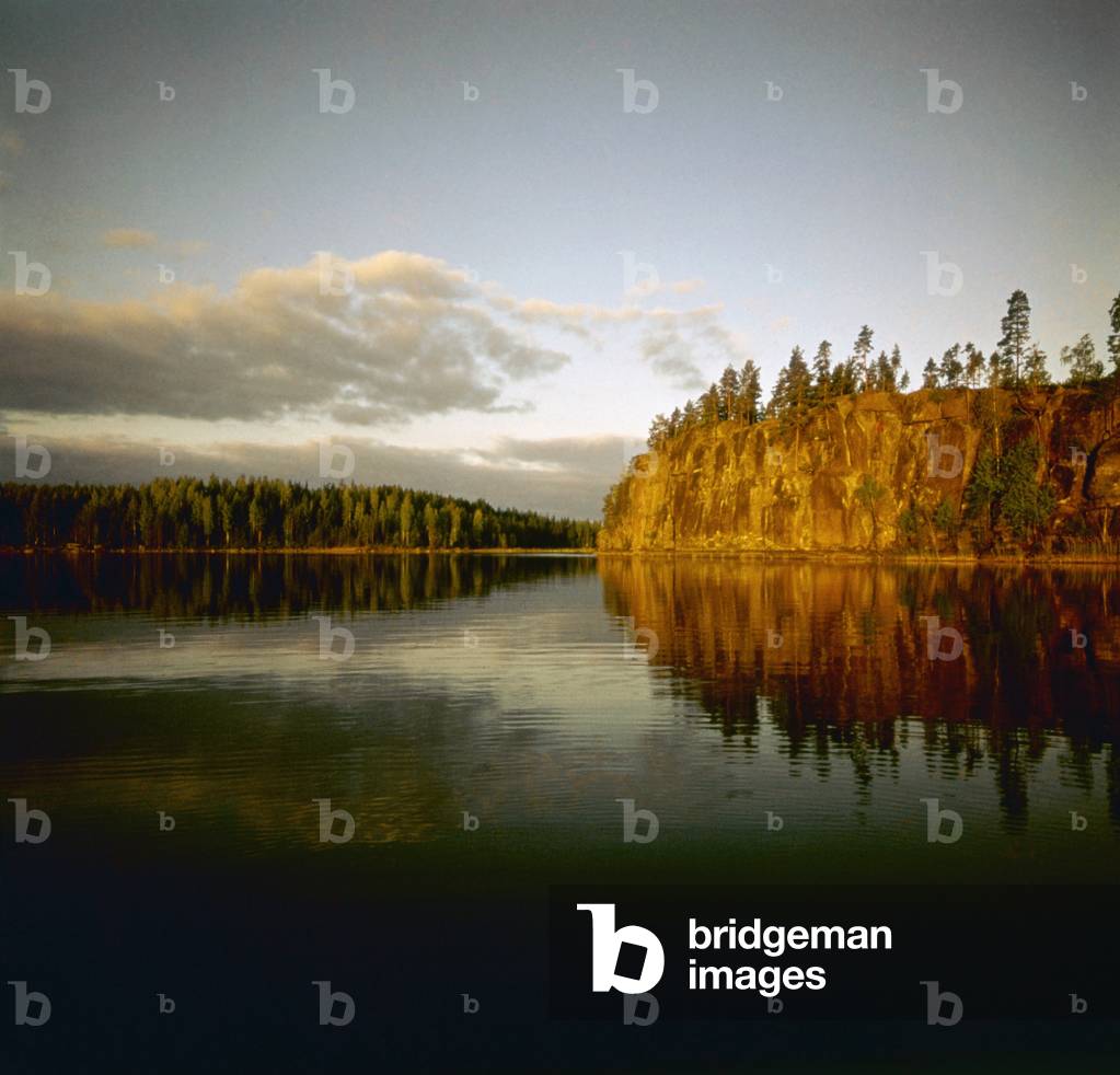 A Finnish lake and an endless forest in the background, Finland, 1960s (b/w photo)