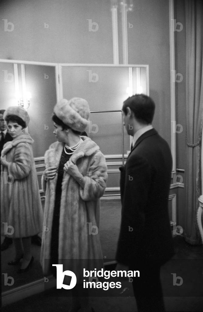 Gina Lollobrigida in a tailor's shop, France, Paris, 1963 (b/w photo)