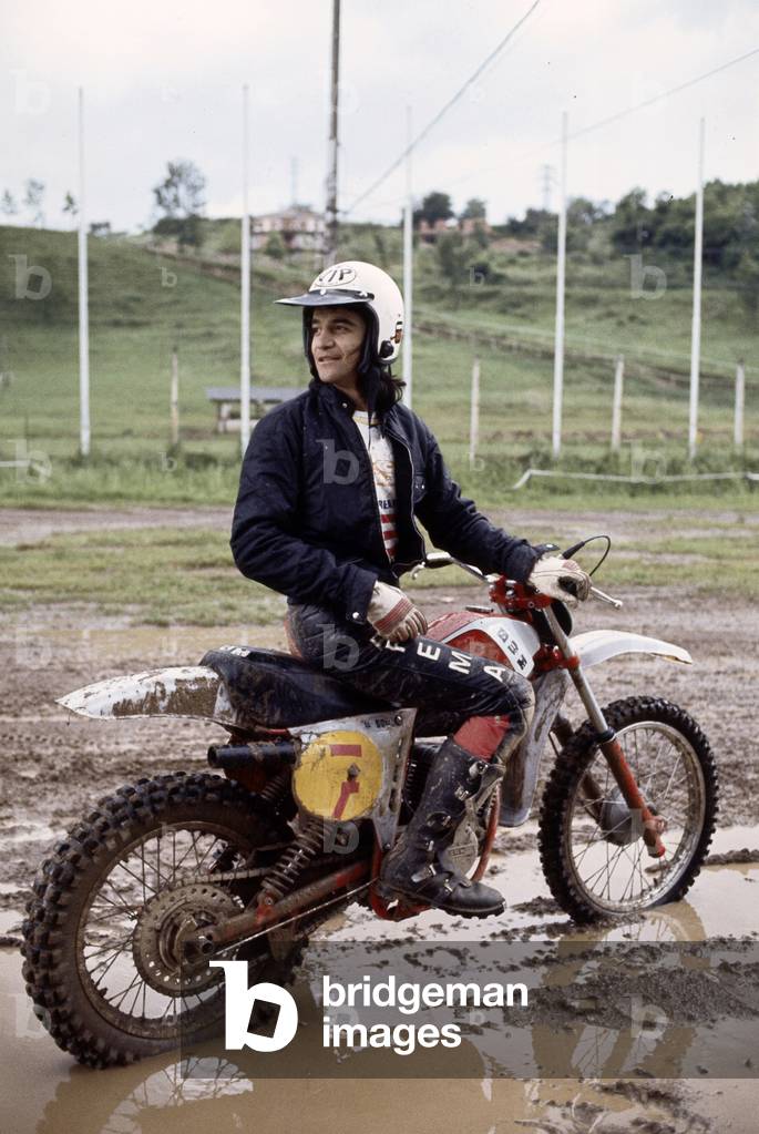 Drupi driving a cross-country motorcycle, Italy