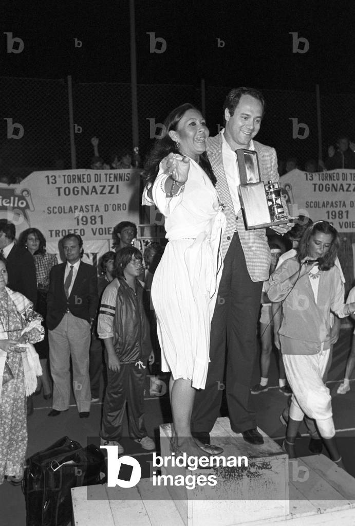 Carlo Verdone and Franca Bettoja at Villaggio Tognazzi, Italy, 1981 (b/w photo)