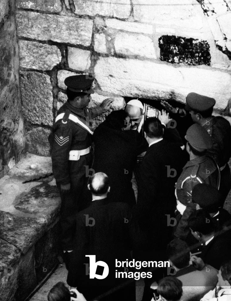 The Pope Paul VI into the Grotto of the Nativity, Palestinian Territory, 1964 (b/w photo)