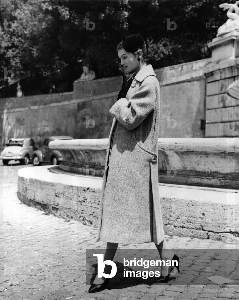 A woman with Ferdinandi's clothes,, 1955