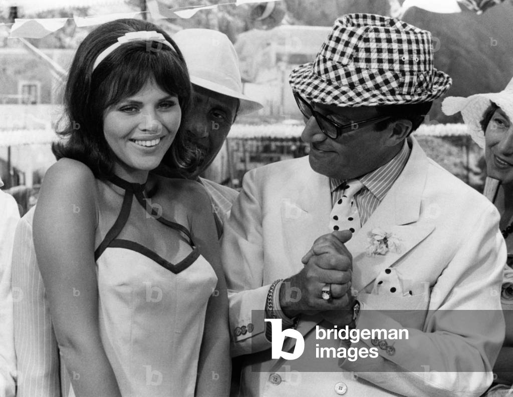 Peter Sellers and Britt-Marie Ekland in 'After the fox', 1966 (b/w photo)