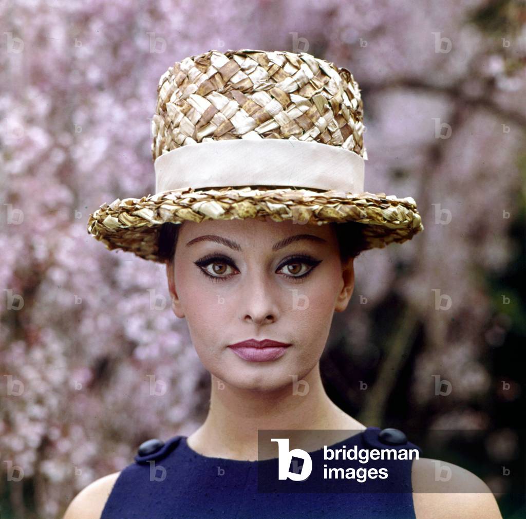 Sophia Loren wearing a straw hat, Italy