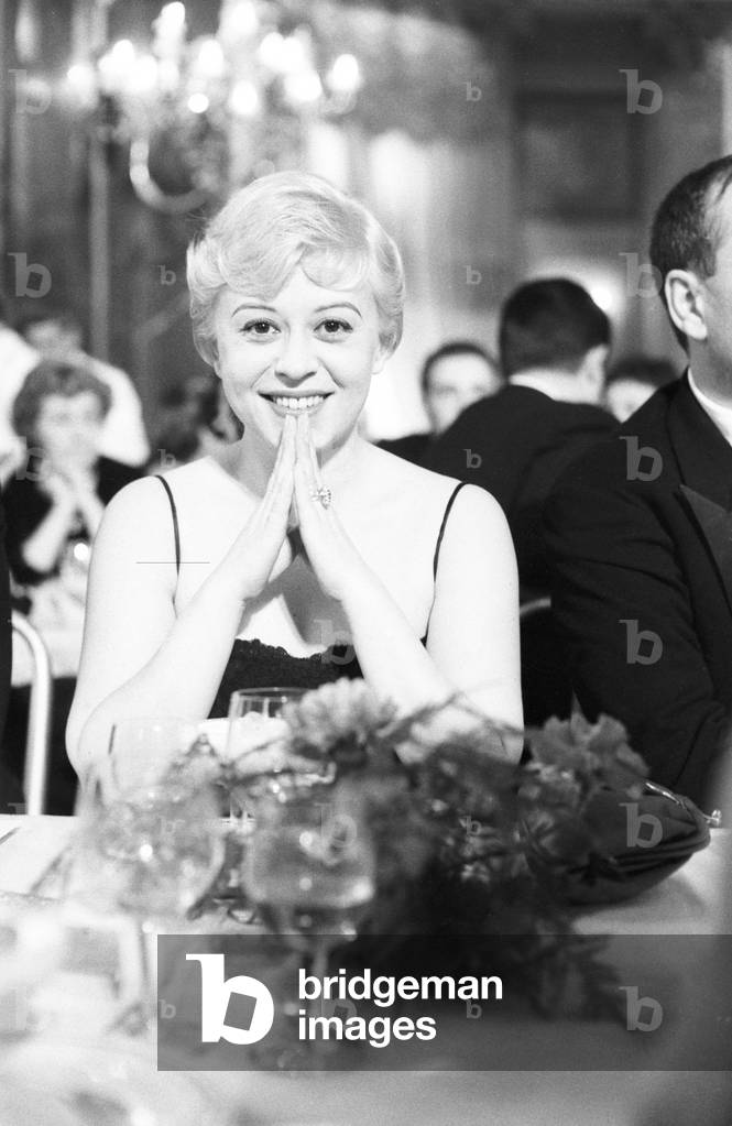 Giulietta Masina attending the Nastri d'Argento awarding ceremony, Italy, 1958 (b/w photo)