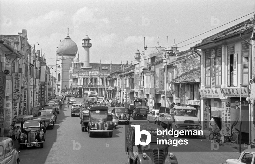 Sultan Mosque facing a crowded street, Singapore, 1962 (b/w photo)