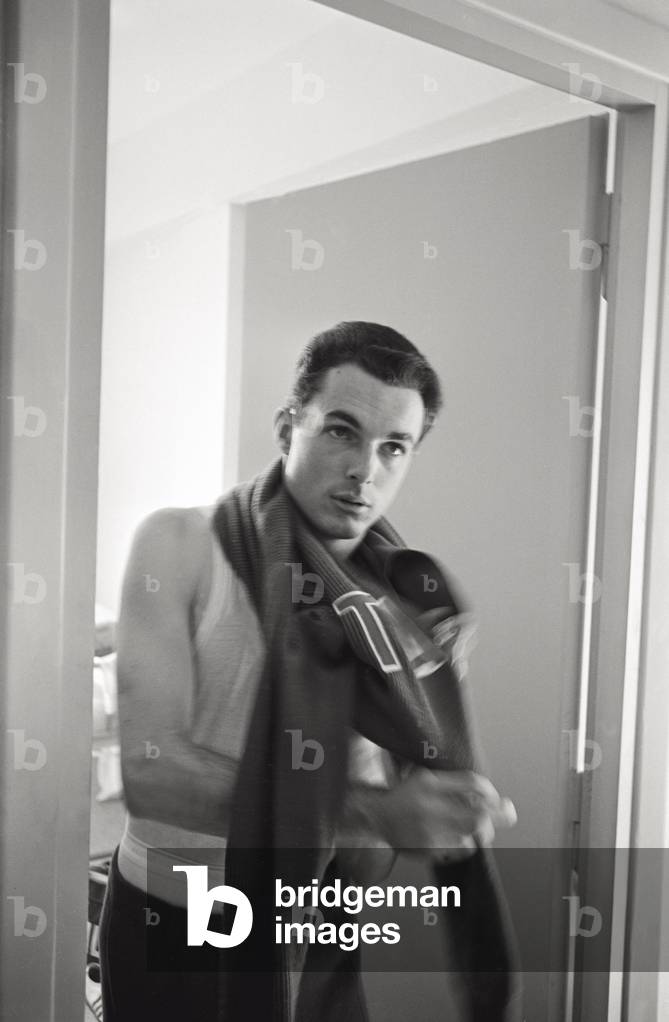 Livio Berruti getting dressed