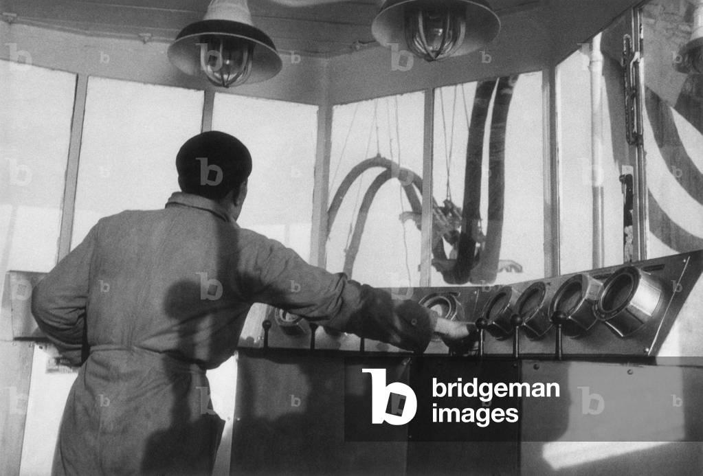 A worker in a control room of a SAROM oil platform, Ravenna, Italy