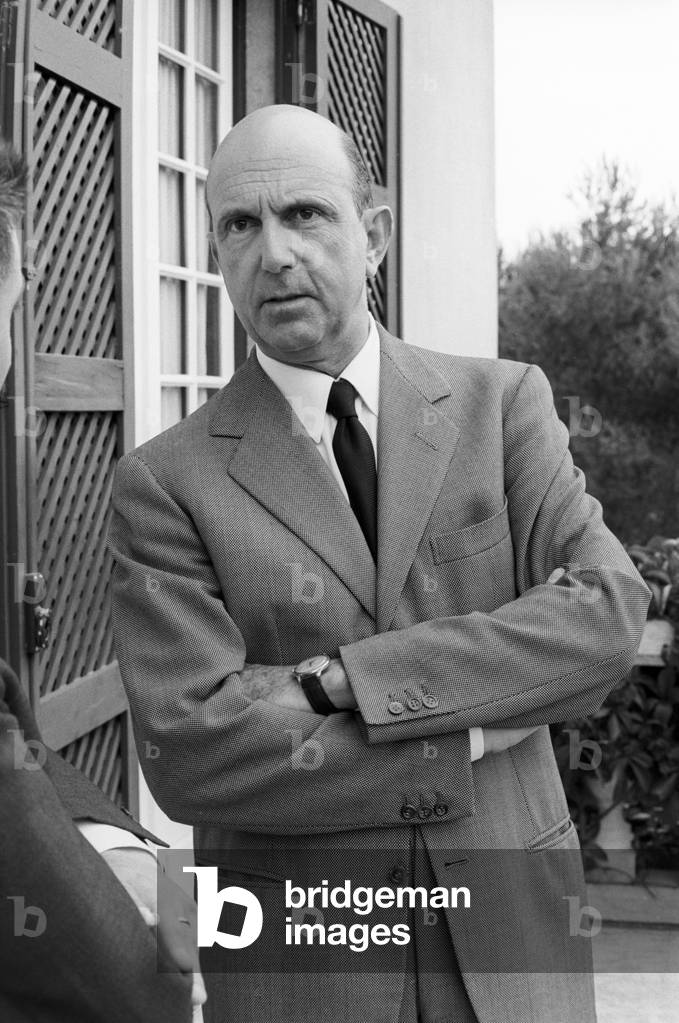 Umberto II of Italy with his arms folded