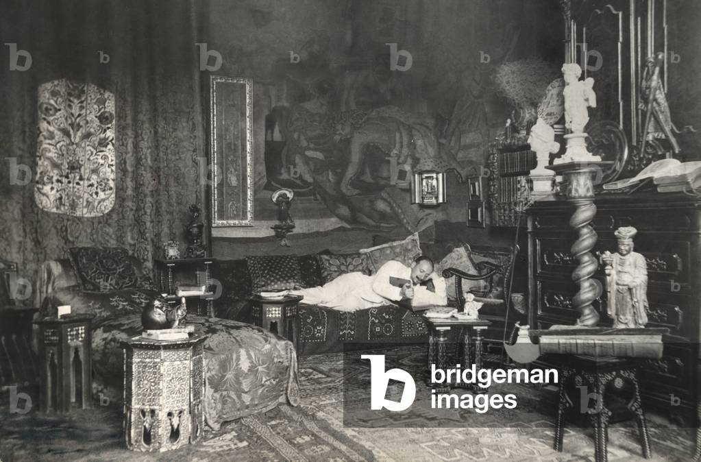 Gabriele D'Annunzio in the study of his mansion