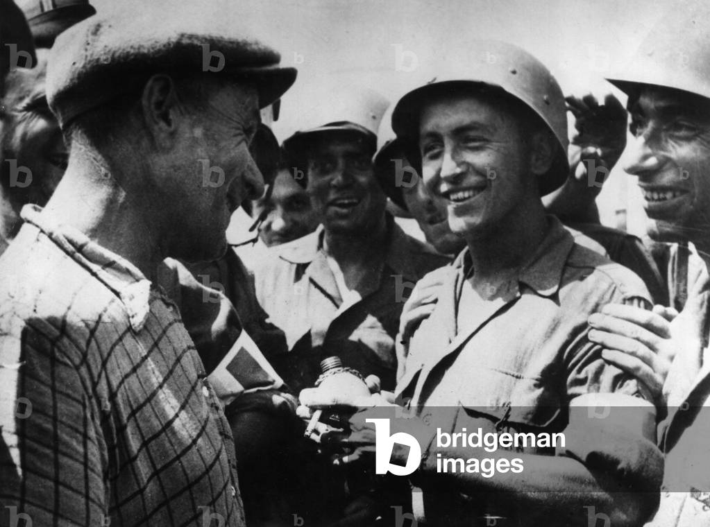 U.S. Army soldiers with a French civilian