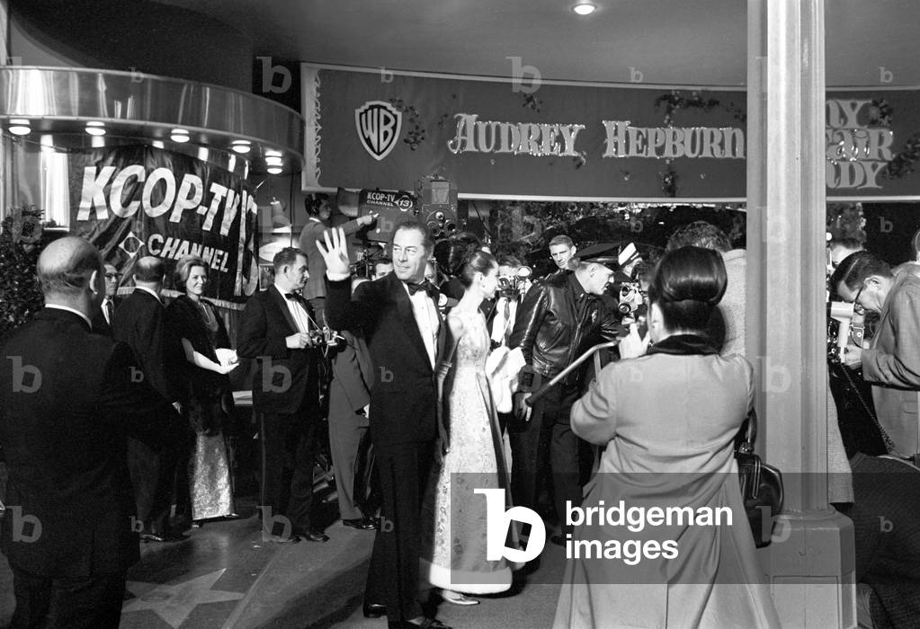 Rex Harrison and Audrey Hepburn at the premiere of the film My Fair Lady (b/w photo)
