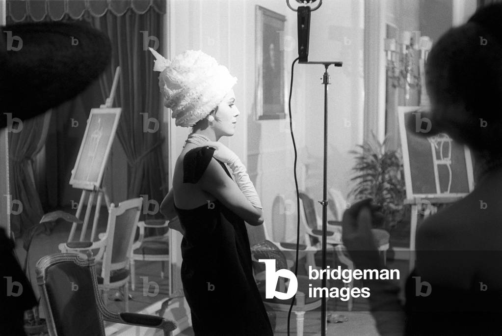 A model poses in a workshop
