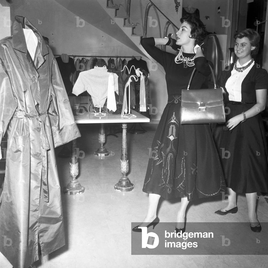 Ava Gardner visiting the Sorelle Fontana fashion house, Italy, 1957 (b/w photo)