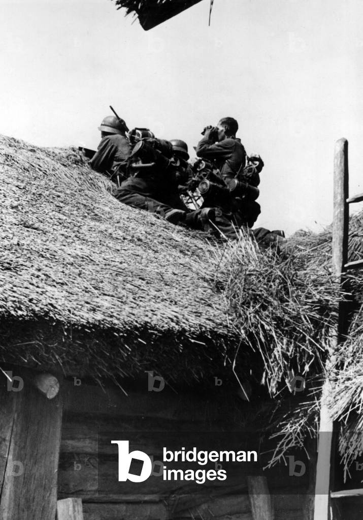 German soldiers positioned on a roof
