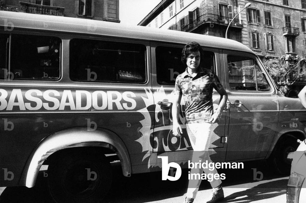 Little Tony beside his van