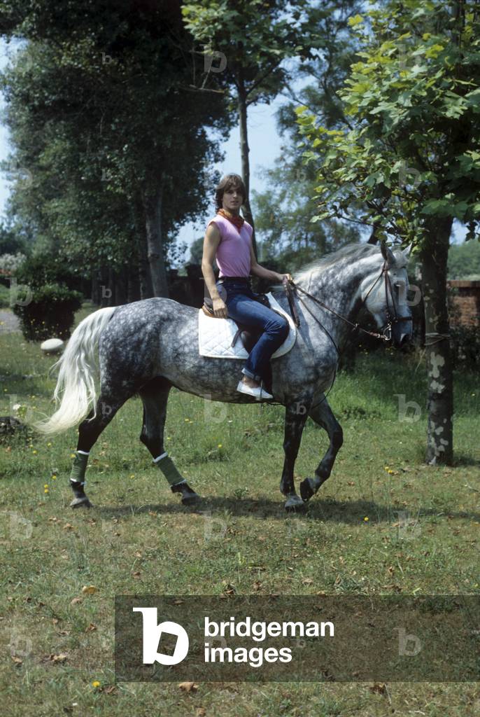 Miguel Bosé riding a horse, Italy