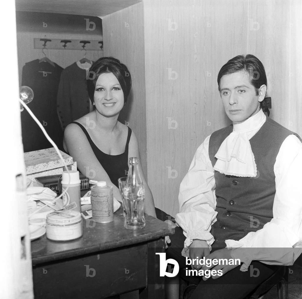 Mina and Corrado Pani in the dressing rooms of Valle theater, Italy, 1963 (b/w photo)
