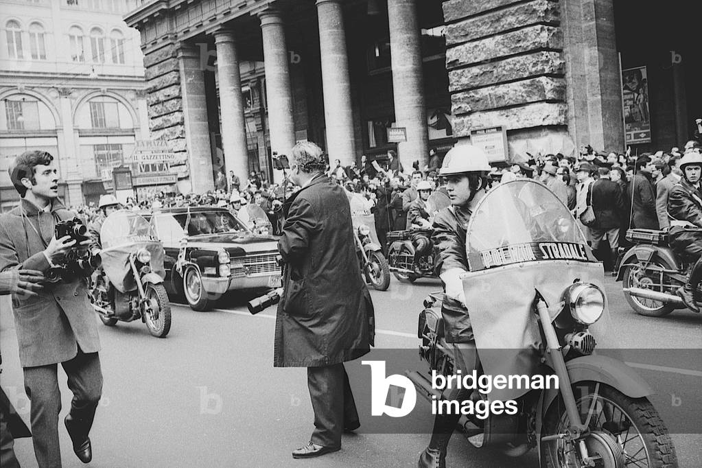 Richard Nixon's car escorted by Carabinieri riding moorbikes, Italy, 1969 (b/w photo)