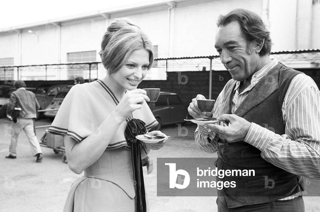 Anthony Quinn and Pamela Tiffin on the set of Los amigos, 1973 (b/w photo)