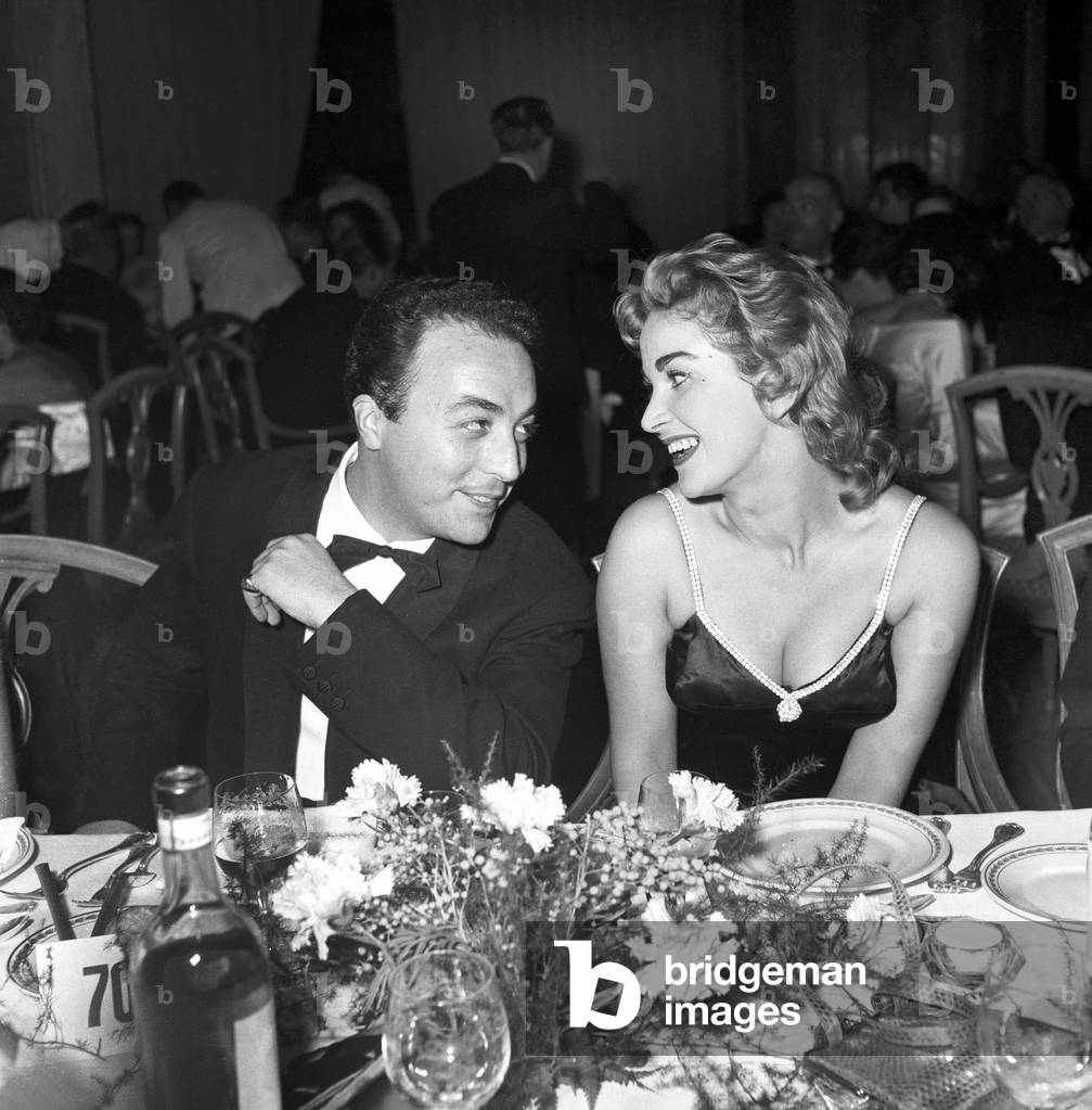 Gino Latilla sitting at the table, Italy, 1956 (b/w photo)