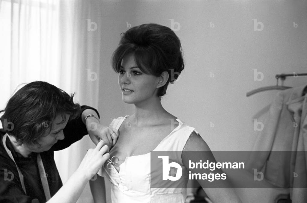 Claudia Cardinale at Nina Ricci's fashion house, France, Paris, 1962 (b/w photo)