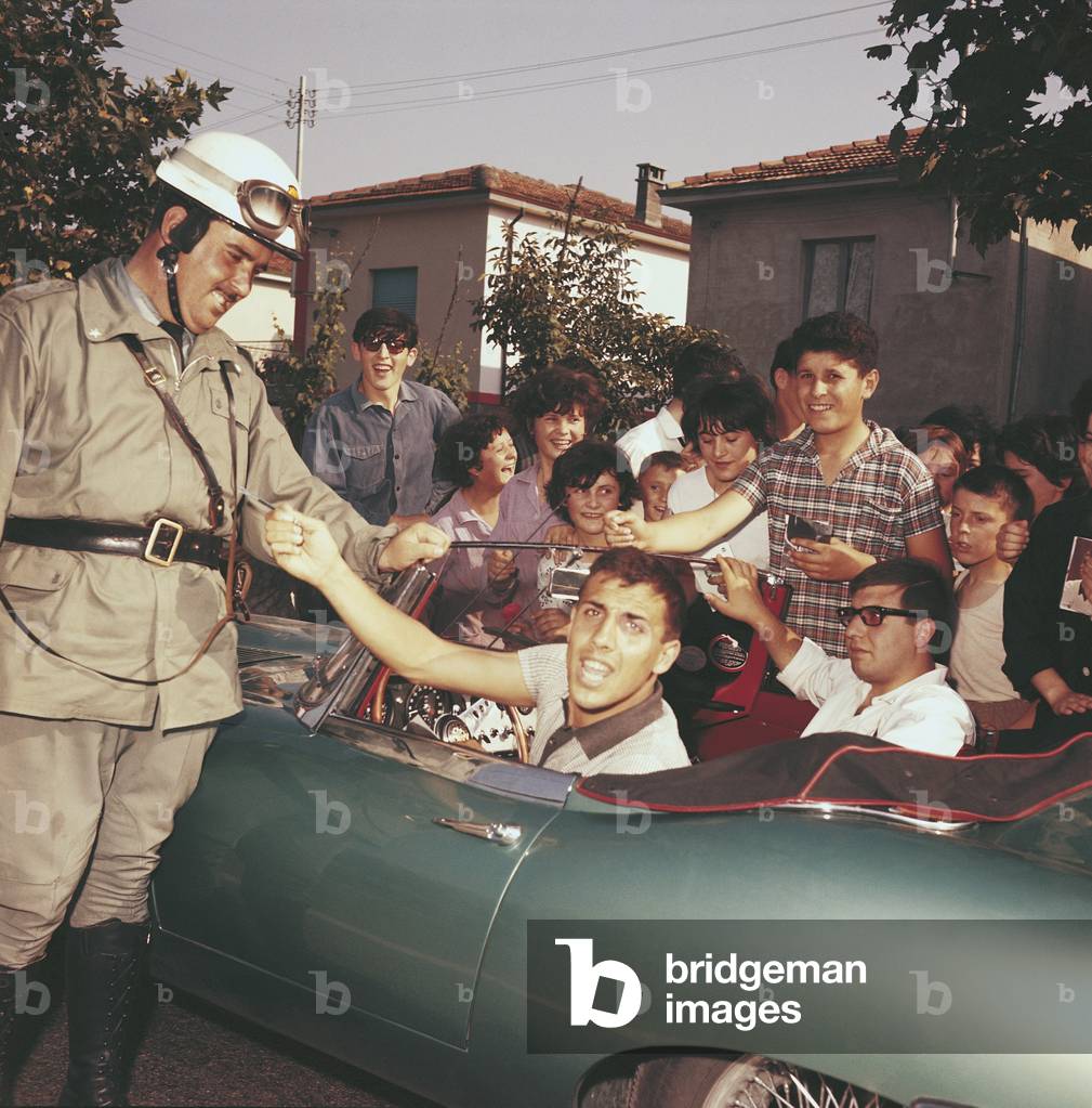 Adriano Celentano greeting some young fans, Italy