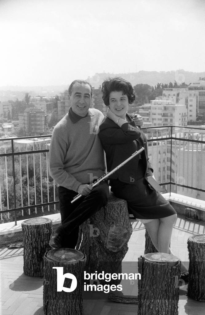 Severino Gazzelloni next to his wife Adriana Mannocci, Rome, Italy, 1965