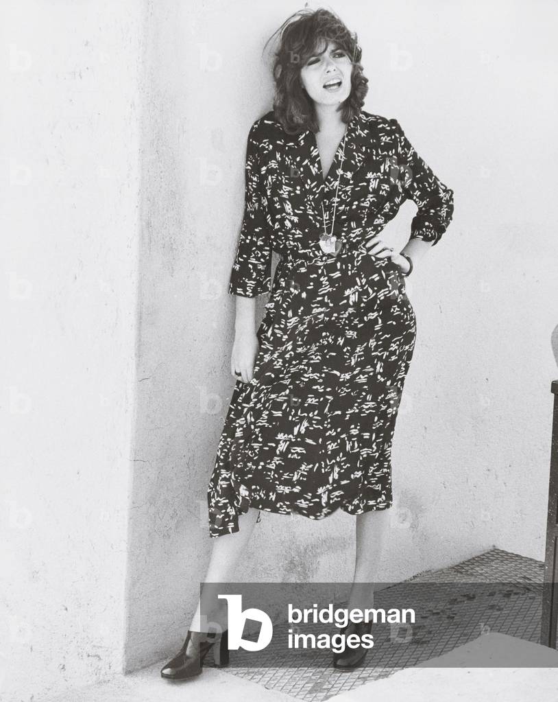 Nada leaning againts a wall, Rome, Italy