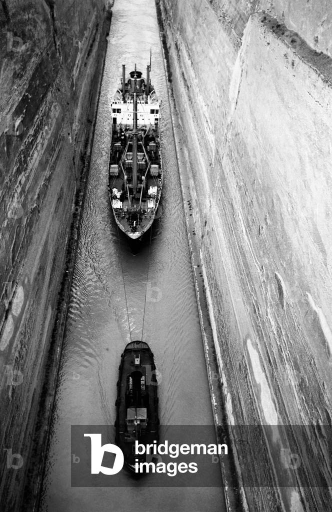 Two boats passing through the straits of Corinth, Corinto, Greece