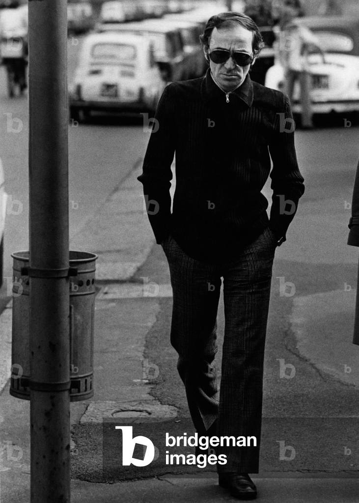 Charles Aznavour strolling through the streets, Milan 1972 (photo)