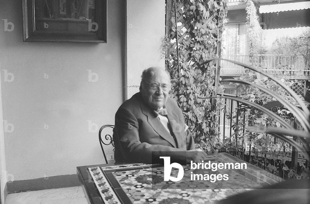 Riccardo Bacchelli posing in his house, Italy, 1975 (b/w photo)