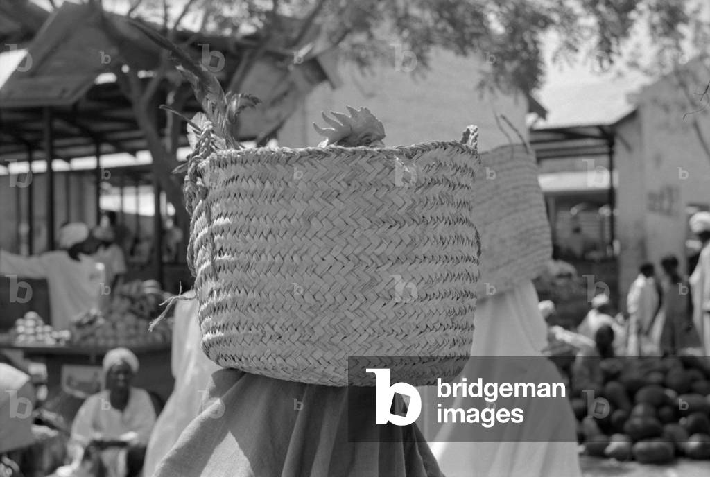 Rooster in a basket, Khartoum, April 1965 (b/w photo)