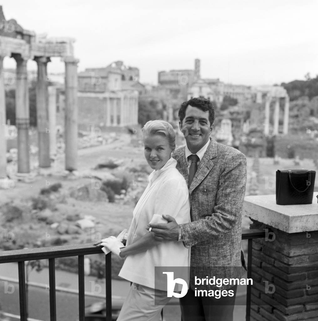 Dean Martin and Jeanne Riegger on the film set of Ten Thousand Bedrooms, Italy, 1956 (b/w photo)