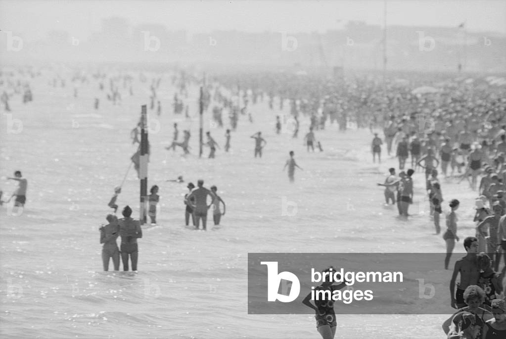 15th August 1969 - Crowds of bathers storming the beaches, Italy, 1969 (b/w photo)