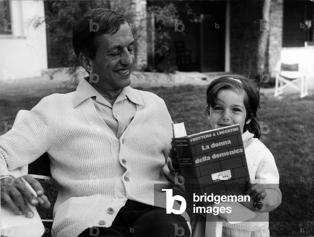 Carlo Fruttero smiling with his daughter